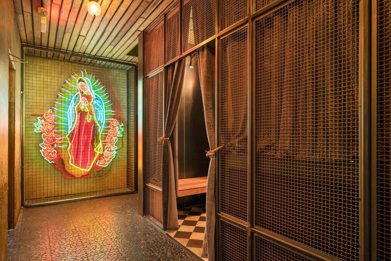 El Cockfight neon sign and private room